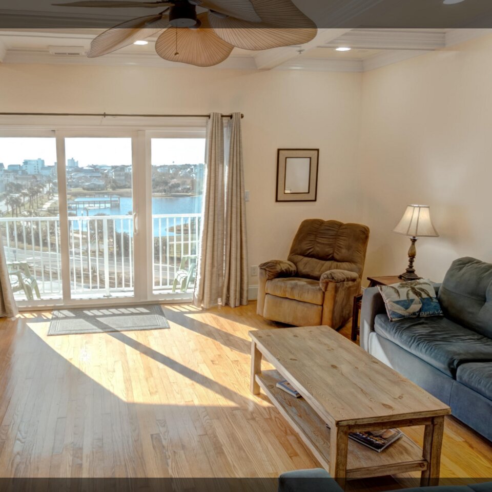360 virtual tour of a coastal condo living room with balcony ocean view — real estate virtual tours by Lifted Pictures