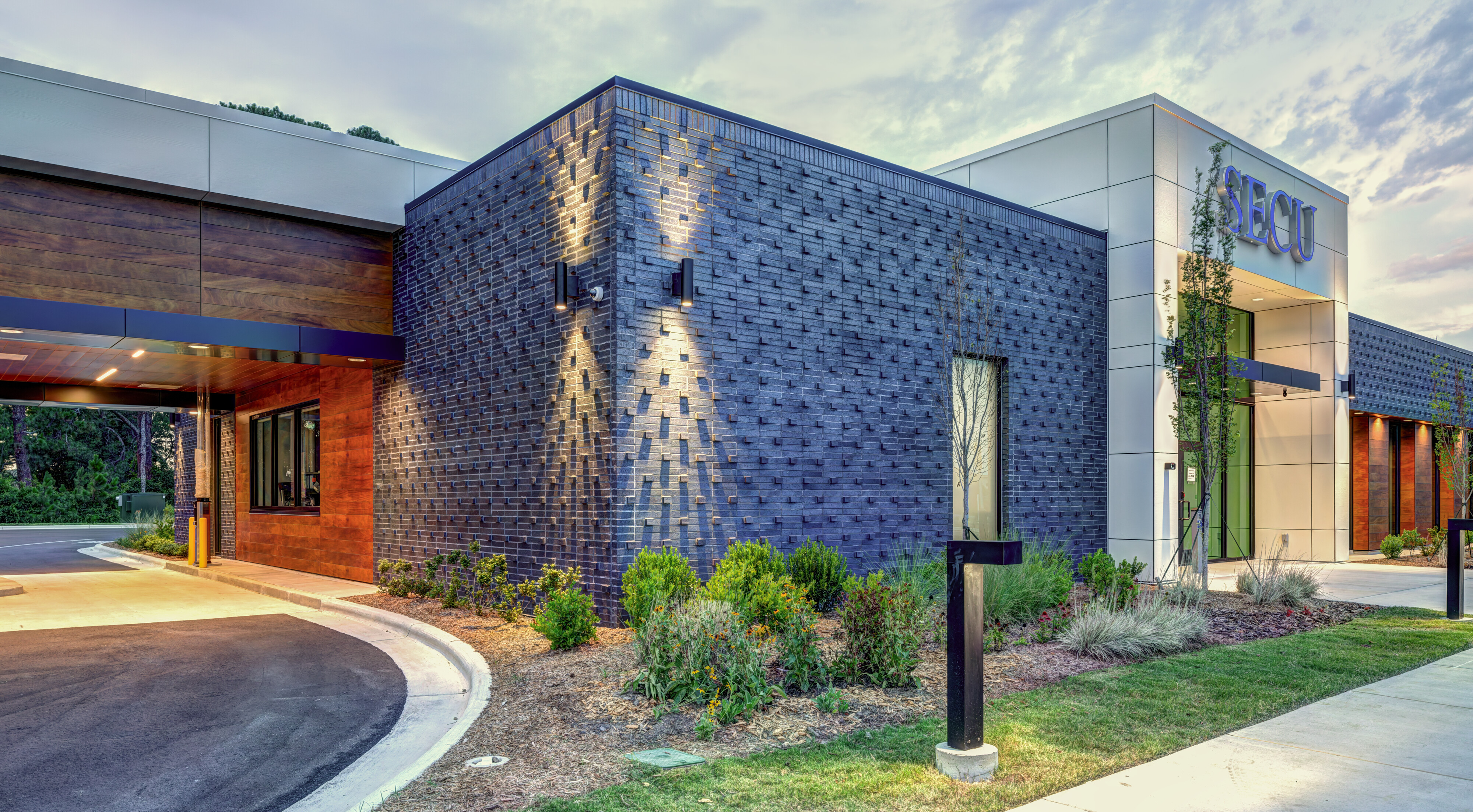 SECU contemporary branch building photographed at blue hour